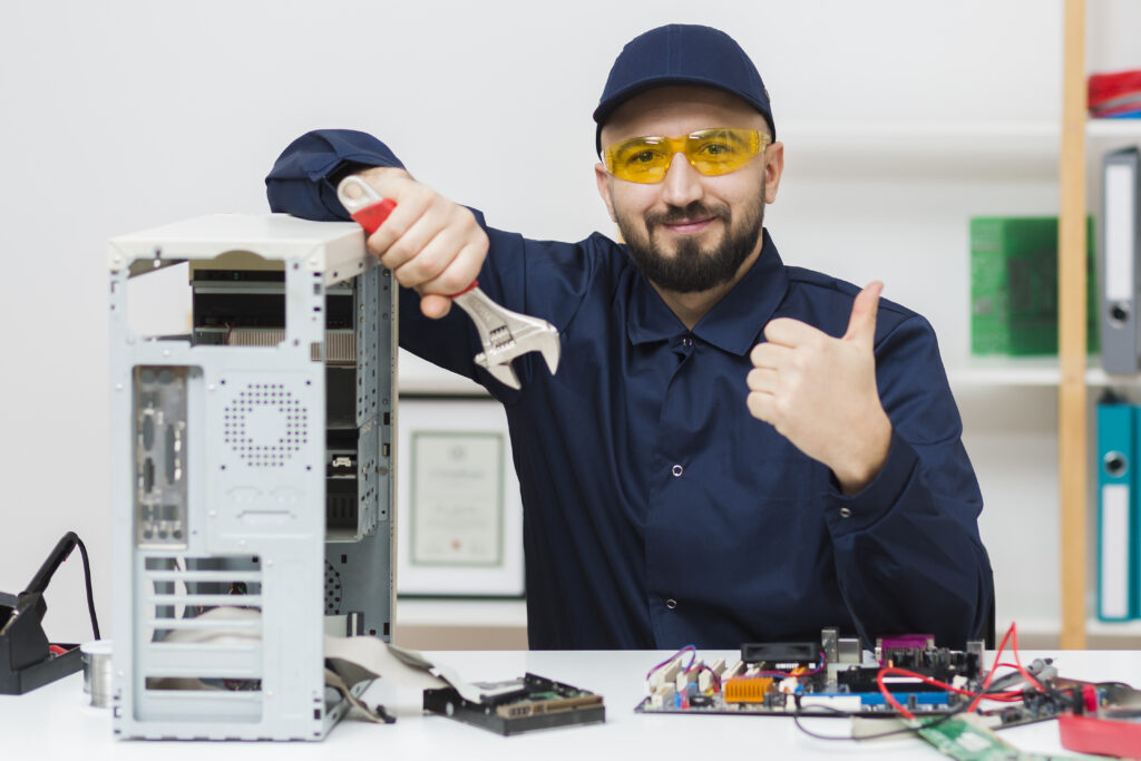 front-view-man-troubleshooting-computer